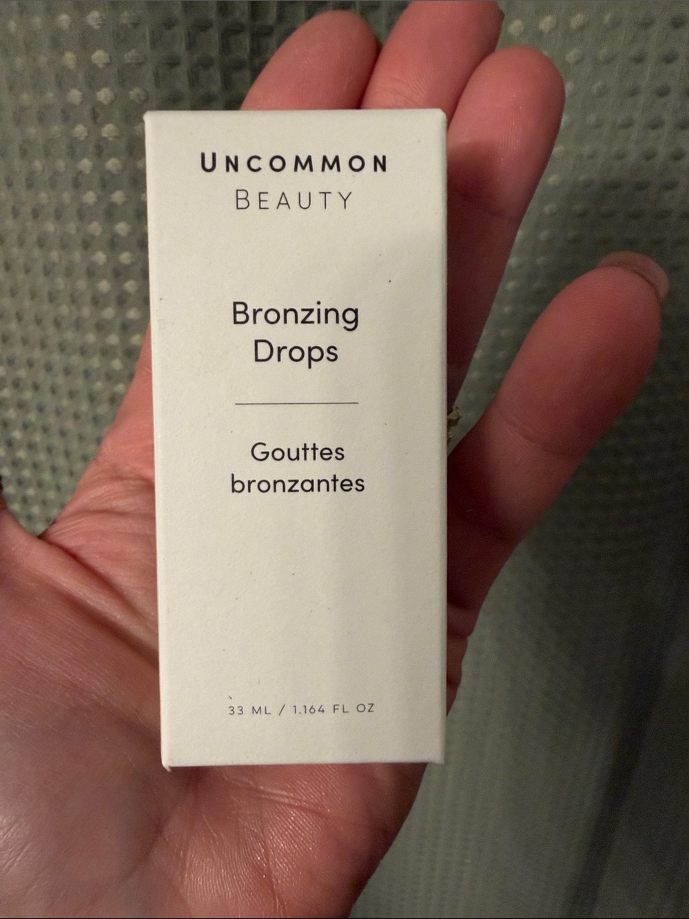 Uncommon Beauty Bronzing Drops — cream white